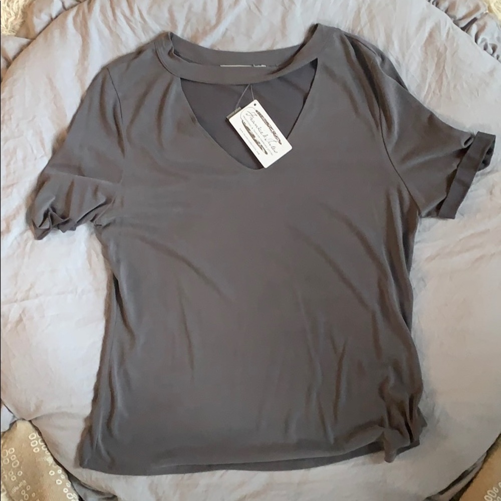 Short sleeved tee shirt with v neck and collar